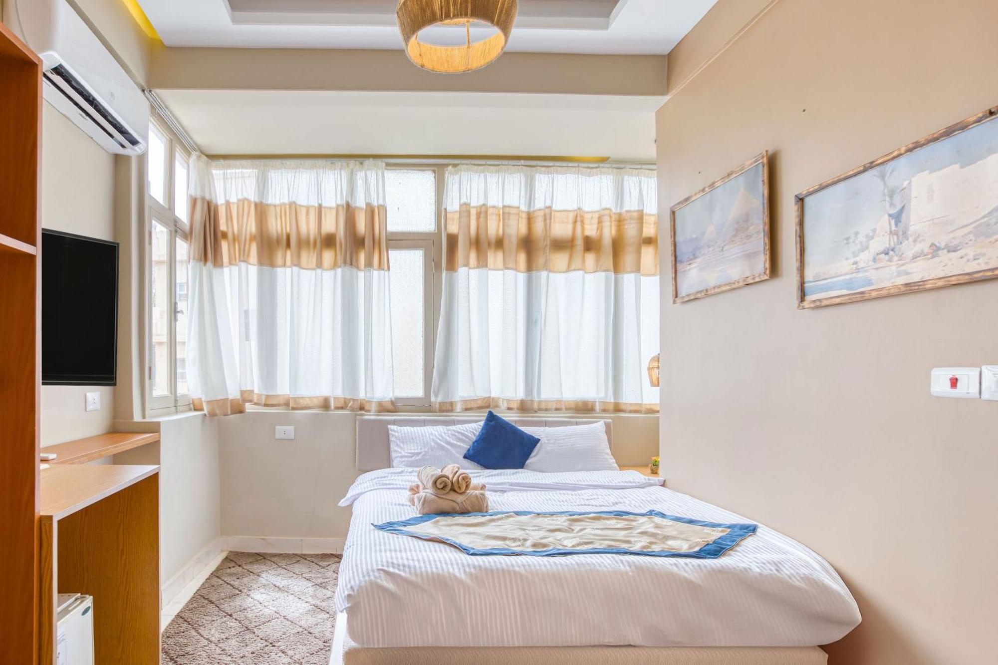 The Grand Pyramids View Hotel Kafret el-Gabal Cameră foto