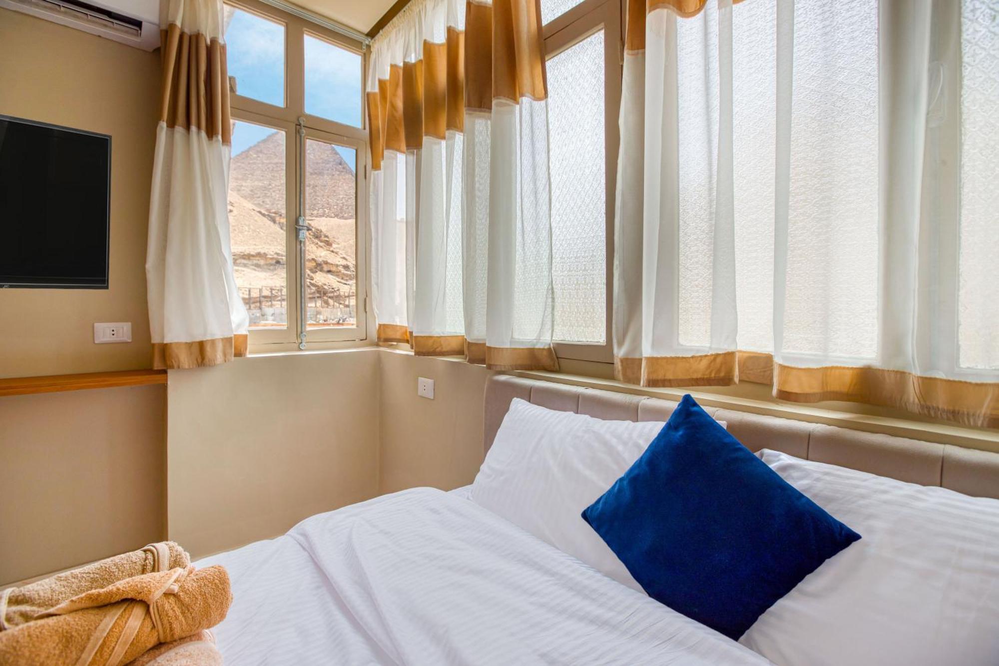 The Grand Pyramids View Hotel Kafret el-Gabal Cameră foto