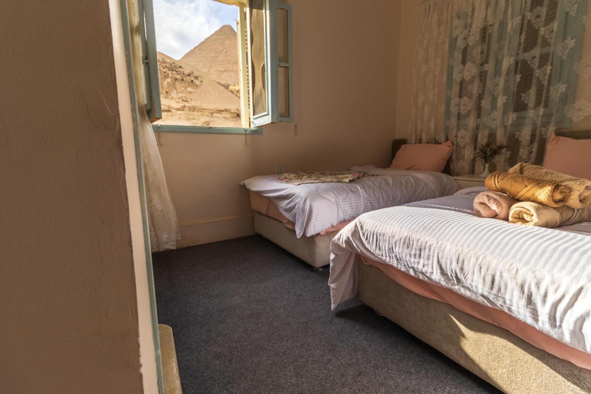 The Grand Pyramids View Hotel Kafret el-Gabal Cameră foto