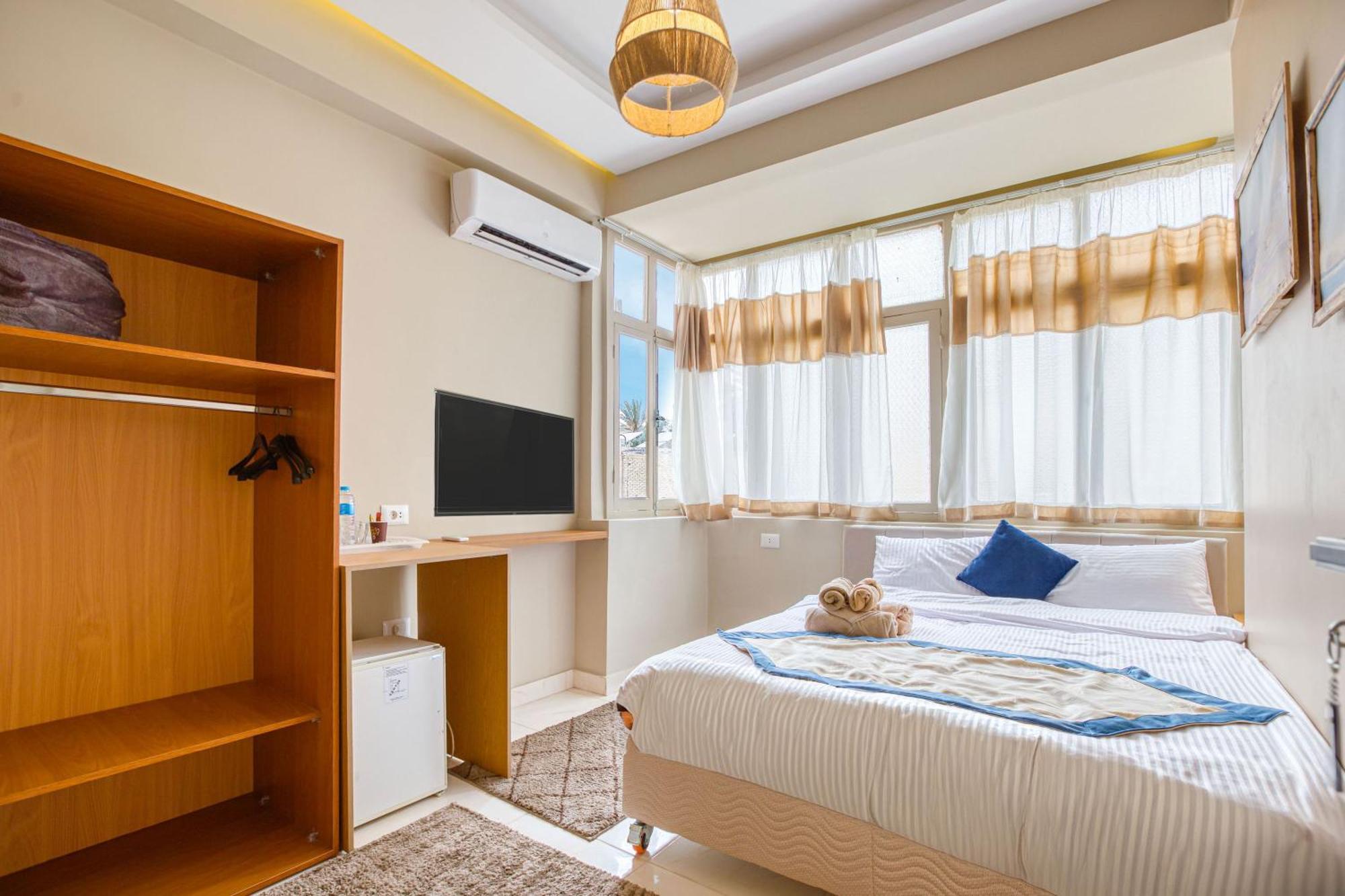 The Grand Pyramids View Hotel Kafret el-Gabal Cameră foto