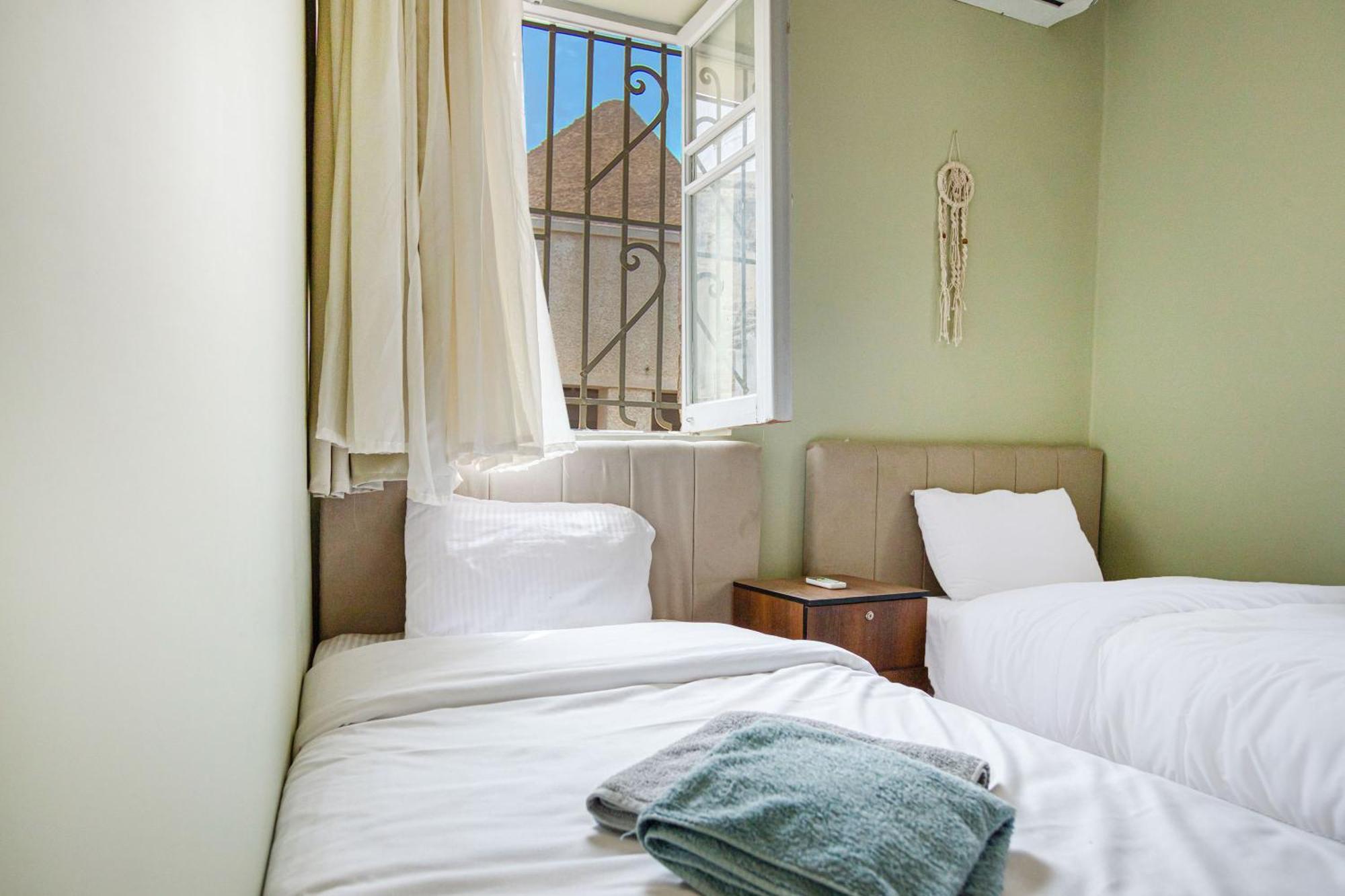 The Grand Pyramids View Hotel Kafret el-Gabal Cameră foto